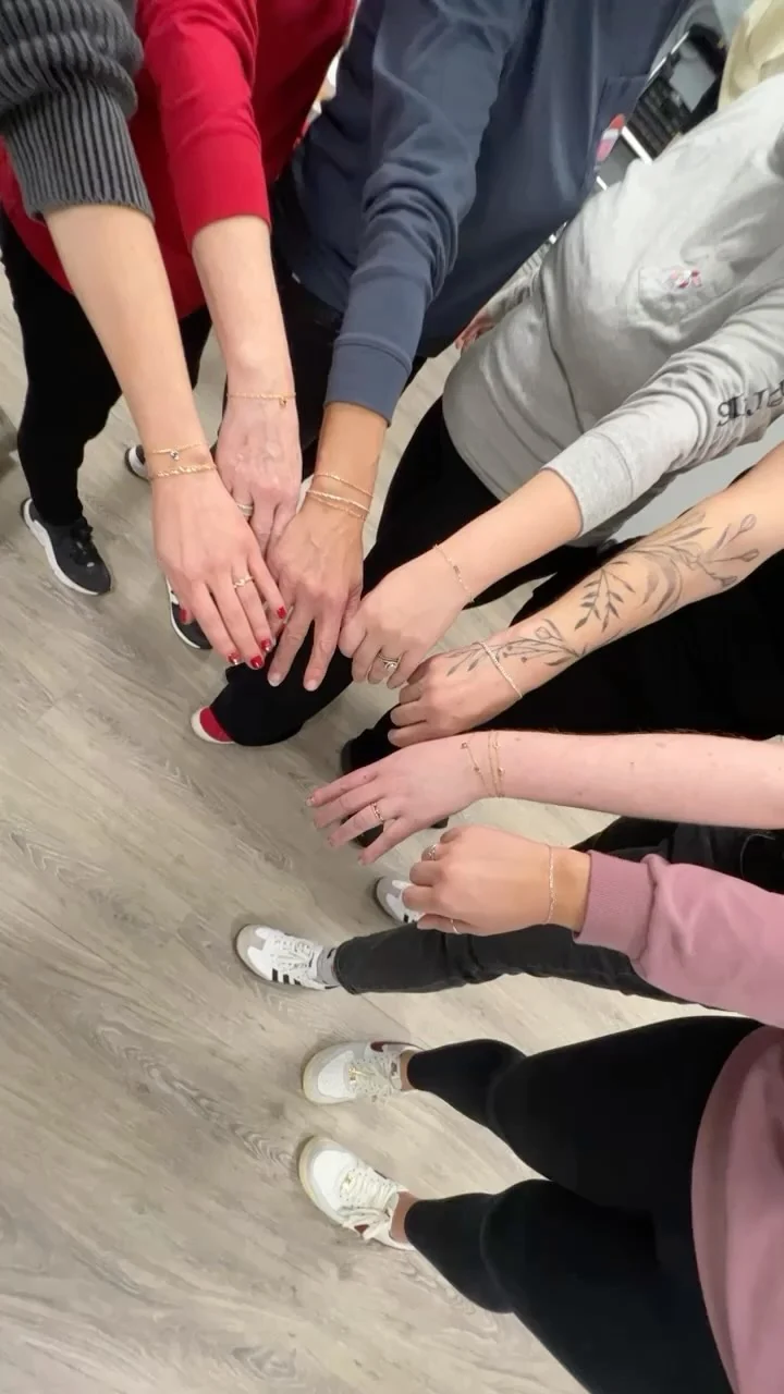 Friends sharing their bracelets after a Heart Lynx experience